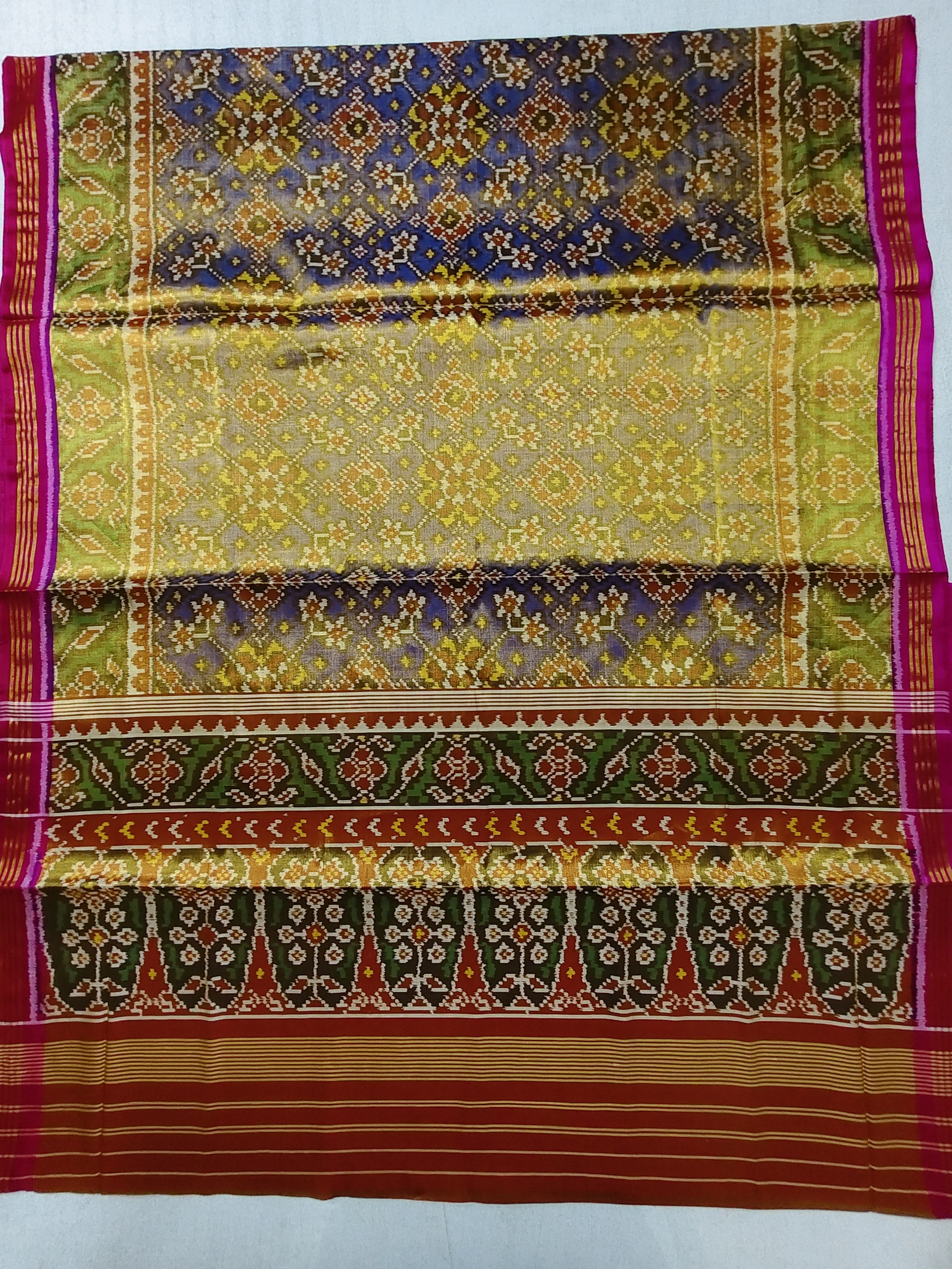 Tissue Patola Saree with Triful Border and Blue Navratan Motifs