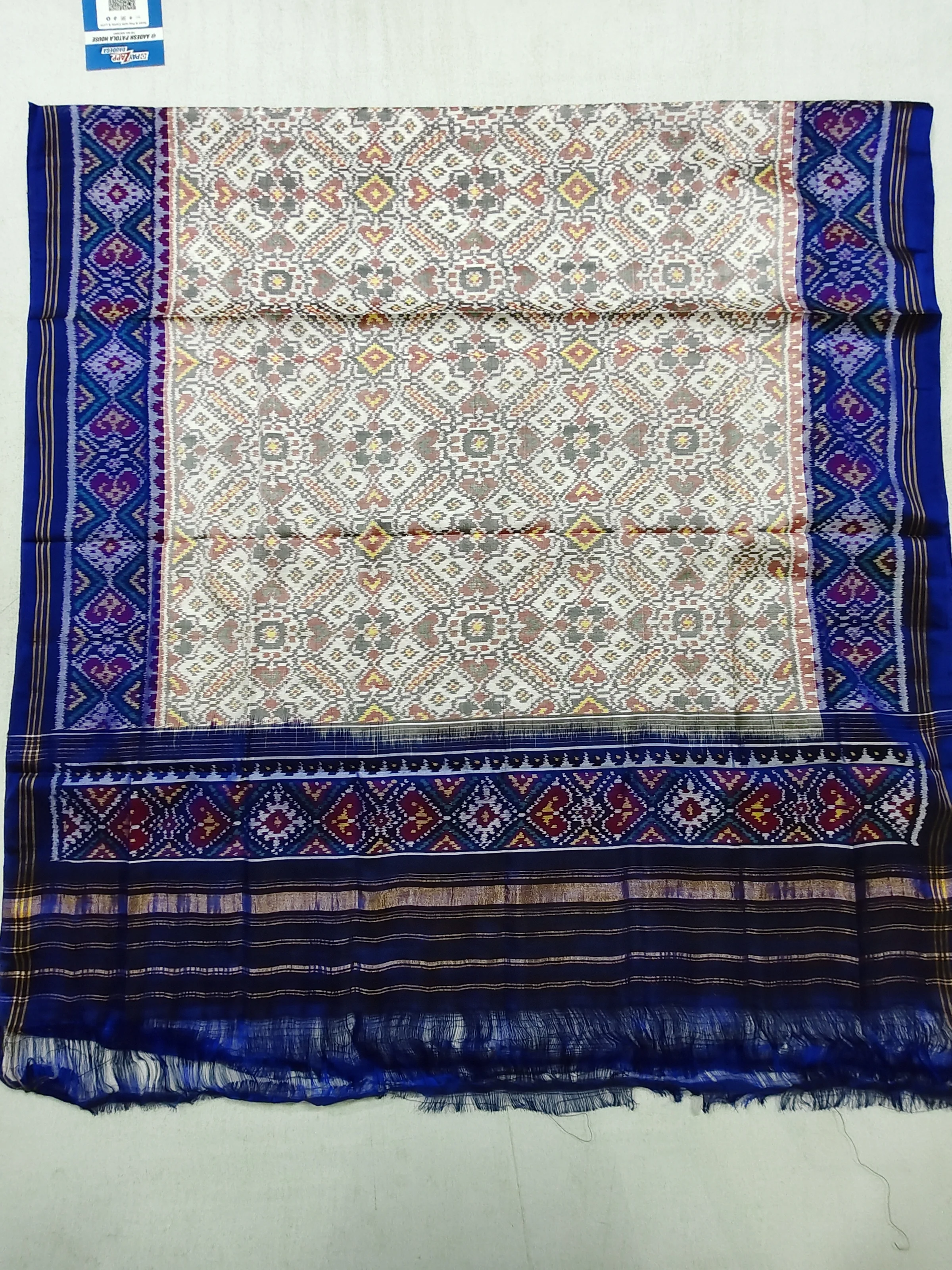 Blue Selari Border White Manekchowk Motifs Single Ikat Chaniya Choli Dupatta 8 Ply Silk