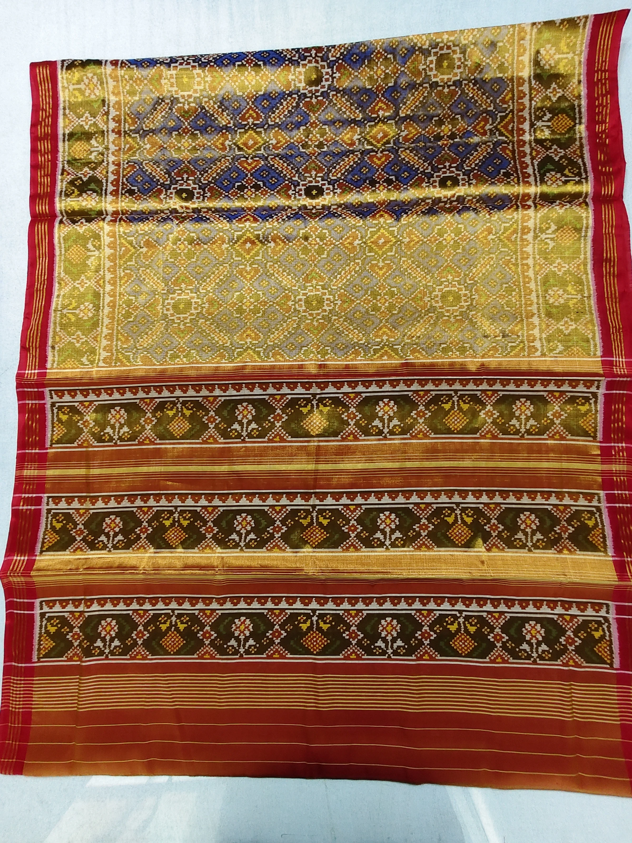 Tissue Patola Saree with Ghughra Border and Manekchowk Motifs
