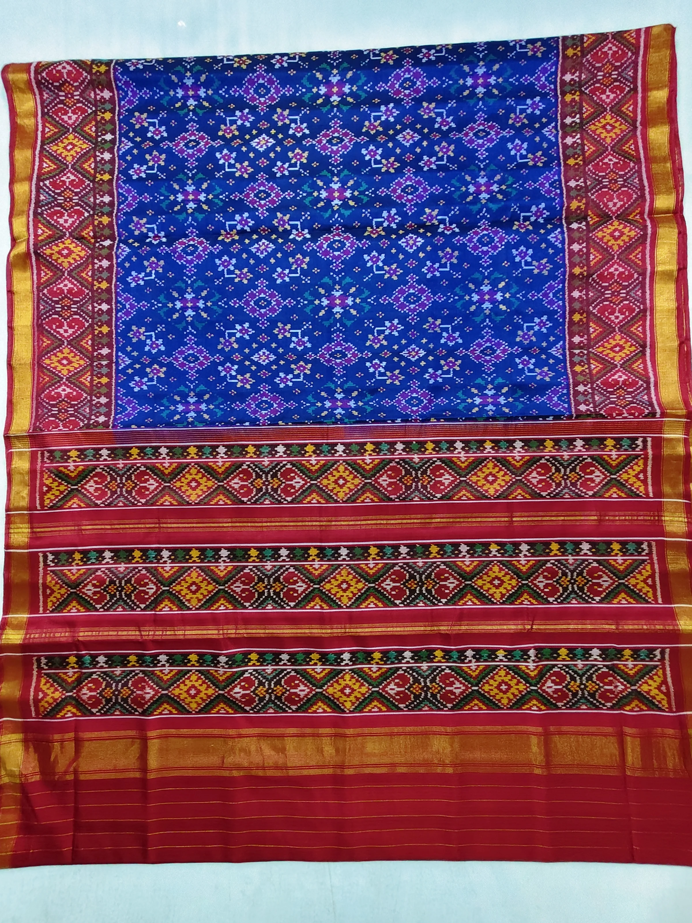 Red Selari Border Blue Navratan Motifs Single Ikat Patola Saree