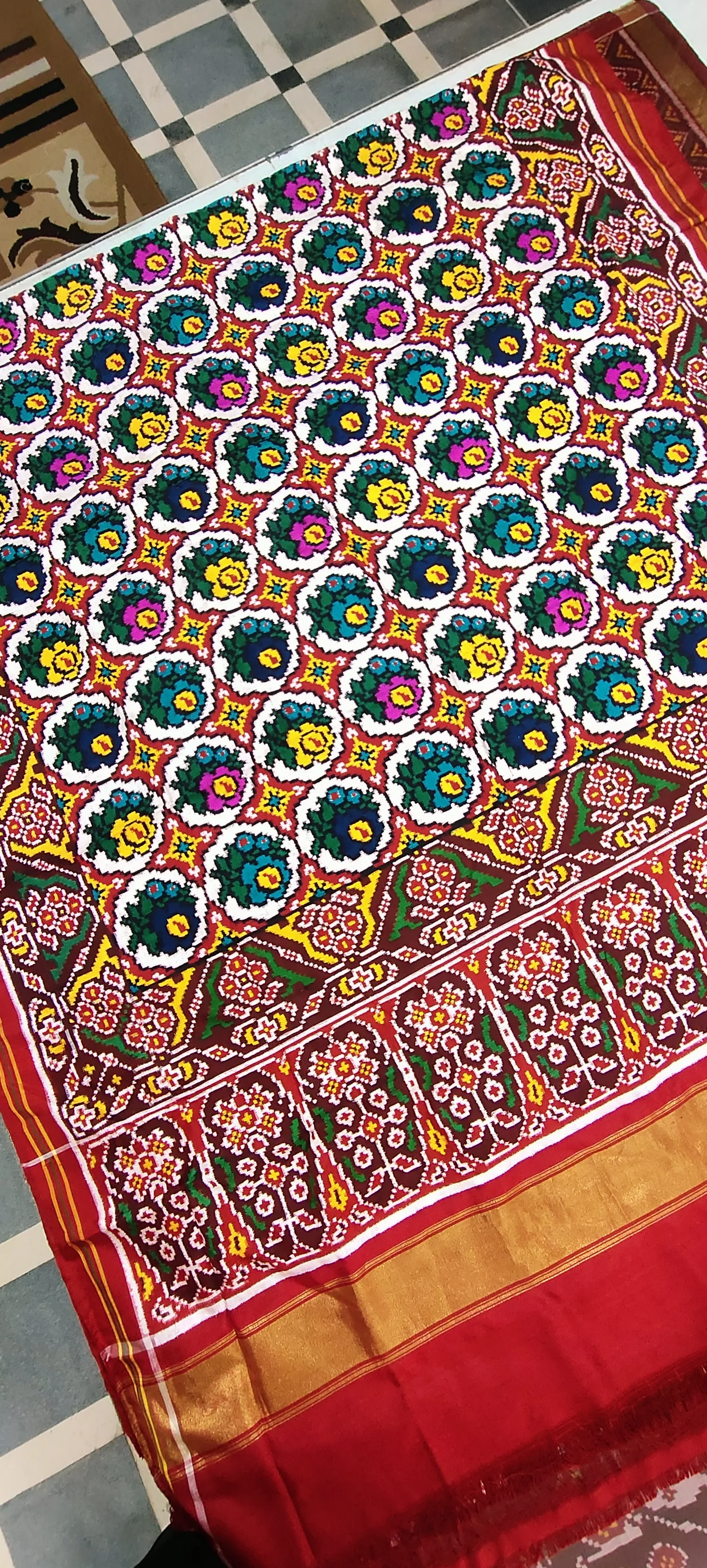 Double Ikat Patola Saree – Red & White Base | Gulab motifs  | Border Triful Motifs