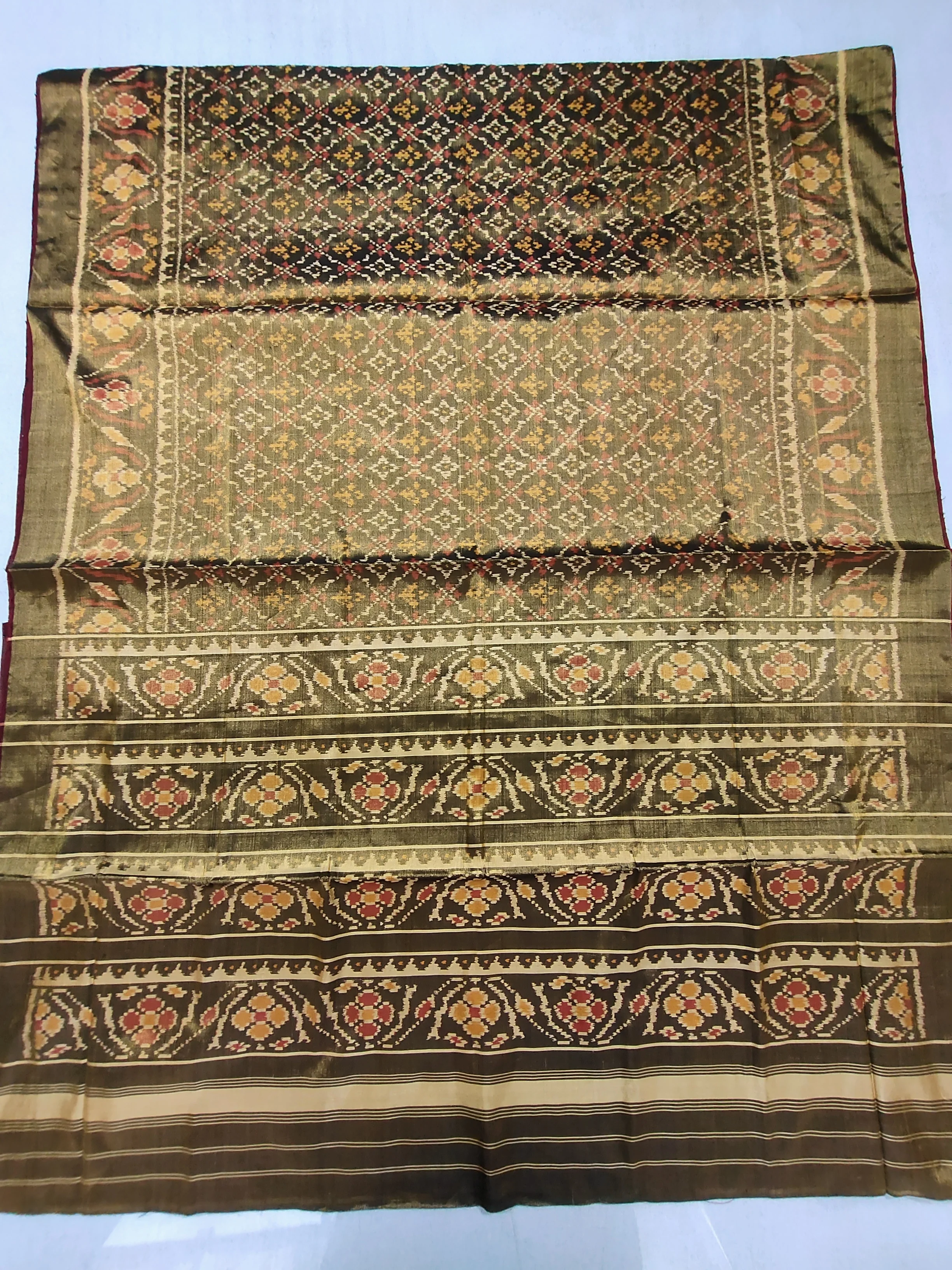 Tissue Patola Saree with Triful Border and Buttonful Motifs