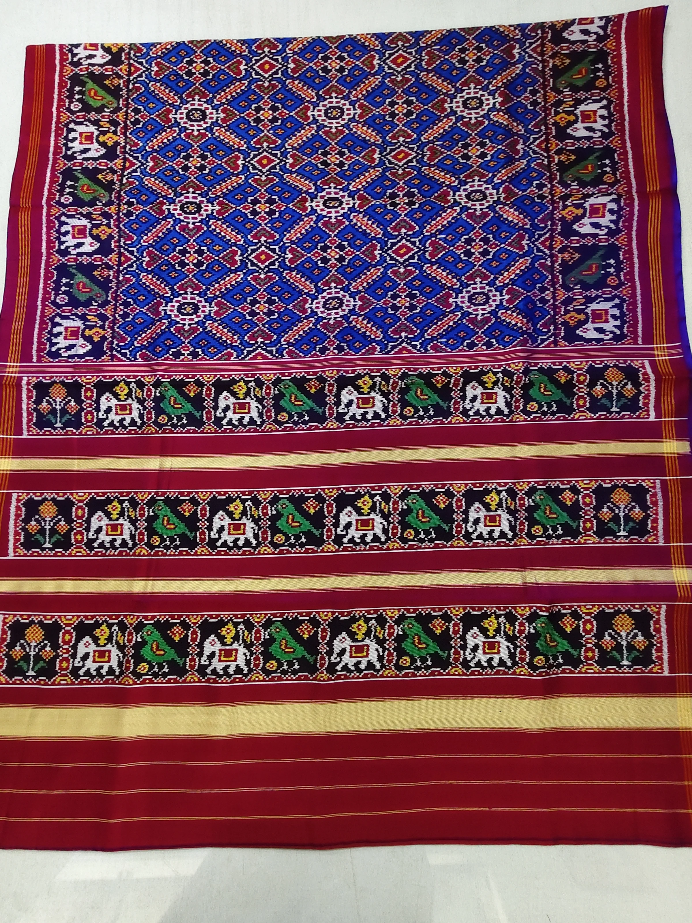 Bluish Red Hathi Popat Border Blue Manekchowk Motifs Twill Ikat Patola Saree