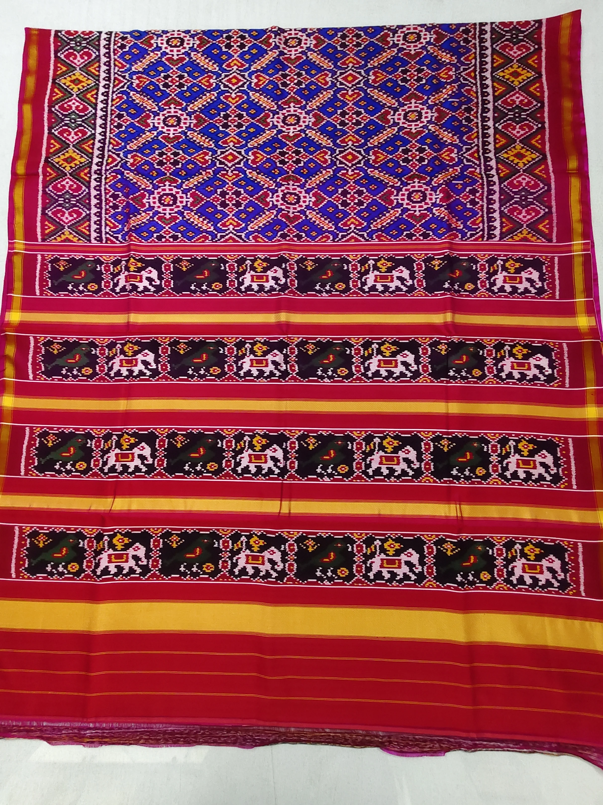 Reddish Pink Hathi Popat Border Blue Manekchowk Twill Ikat Patola Saree